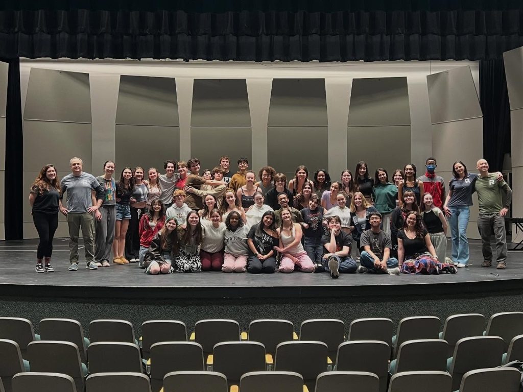 Resonance volunteers with students at South Lakes High School