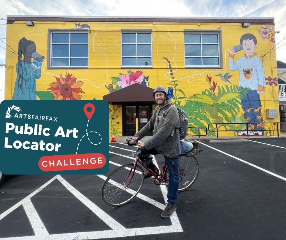 A person on a bike poses in front of a mural by the artist PePe Gaka in Annandale, on the facade of ACCA CDC.