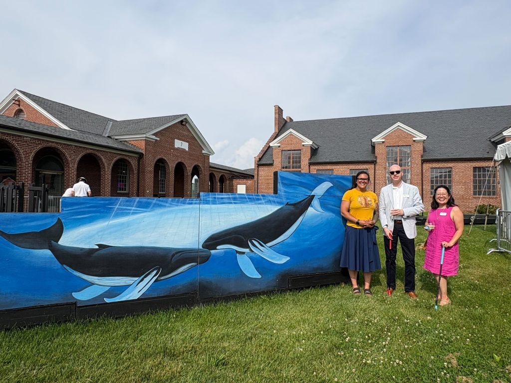 ArtsFairfax President & CEO Stuart Holt and ArtsFairfax Director of Advocacy & Communications Allison Mui with artist Mia Klavon at Workhouse Arts Center’s Masterpiece Mini Golf.